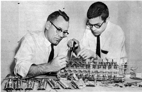 Old black and white photo of Lawrence W. Von Tersch and Julian Kateley working on the MISTIC computer
