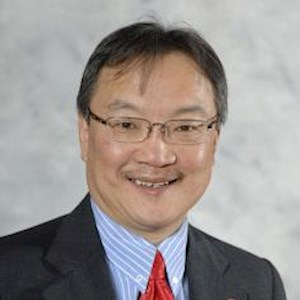 Professional headshot of Andrew Kim