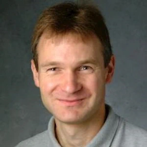 Professional headshot of Norbert Mueller