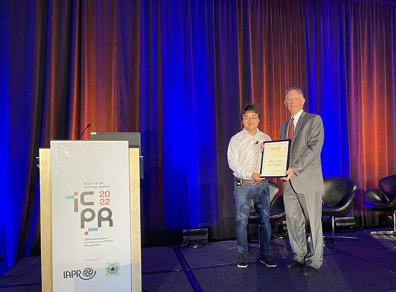 Jiliang Tang was recognized for presenting the prestigious 2022 J.K. Aggarwal Prize Lecture by Daniel Lopresti, president of International Association for Pattern Recognition.