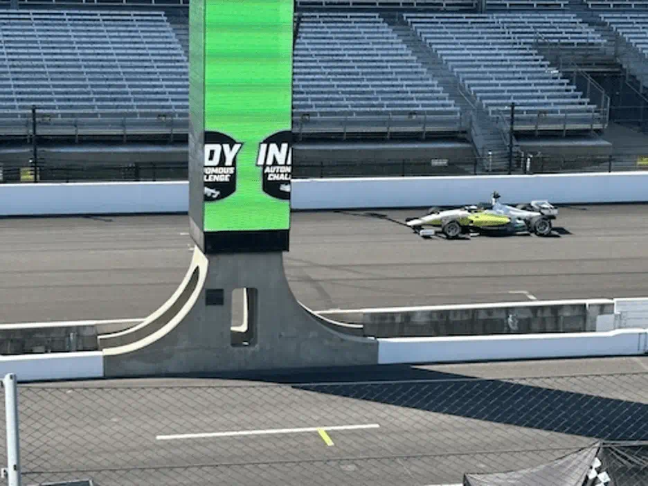PoliMOVE-MSU car rounds the tracks at the Indy Autonomous Challenge at the Indianapolis Motor Speedway