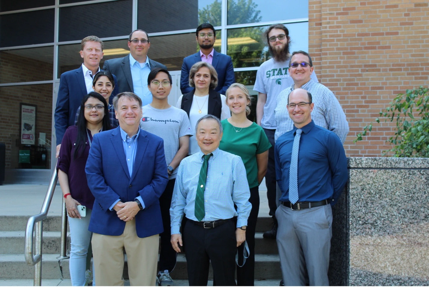 The final class of participants and mentors in the Research Experience for Teachers (RET) posed with College of Engineering Dean Leo Kempel.