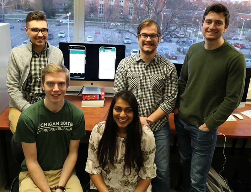 Roy Perryman, Patrick Pale, Ryan Johnson and (front) Scott Swarthout and Nayana Kodur created a mobile app to enhance the MSU experience.