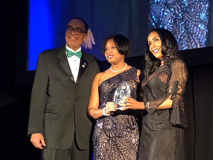 Stephanie Luster-Teasley (center) received an Innovation Award at the 2018 Black Engineer of the Year ceremonies in Washington, D.C., in February. "Through my experiences in MSU's Engineering program, I learned how to be an engineering citizen," she said.