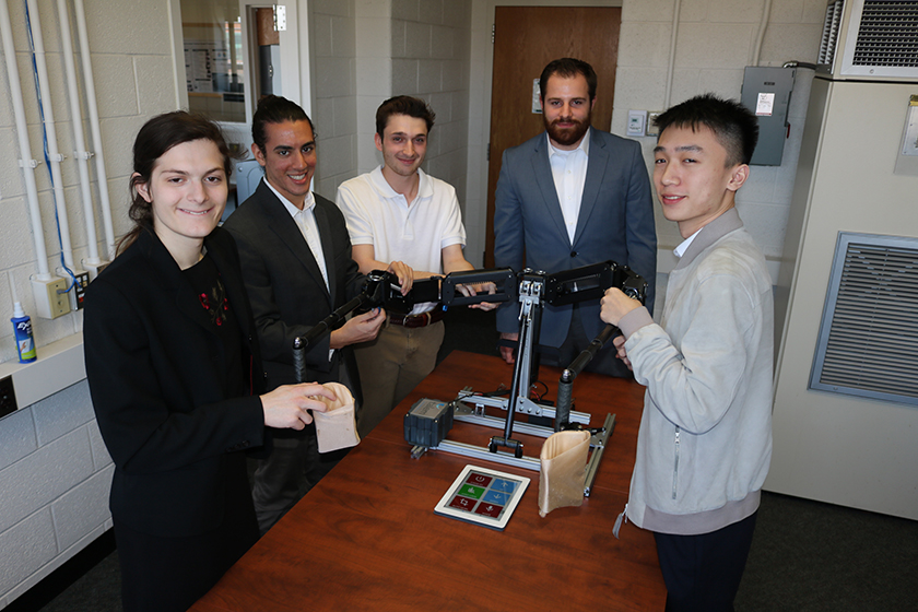 Samantha Oldenburg, Mustafa Jebara, Dane Rosseter, Alex Wuillaume, and Shun Ran created a mobile app that enables people with Duchenne Muscular Dystrophy to regain control of their arms and experience a much larger range of motion.