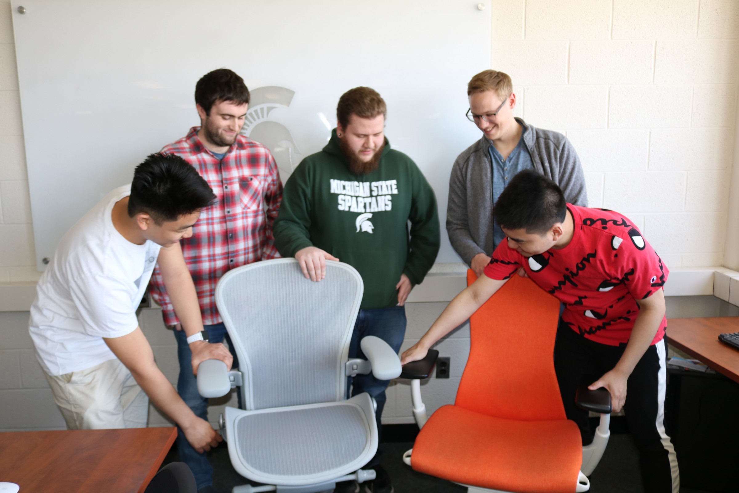 Kevin Gaban, Jacob Weber, Mike Bremiller, Kyle Kinsey, and Han Huang created Adjust - an augmented reality chair adjustment app for Herman Miller chairs of Grand Rapids.