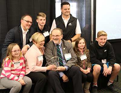 University Distinguished Professor Lawrence Drzal celebrates with his family after receiving the 2018 MSU Technology Transfer Achievement Award in April.