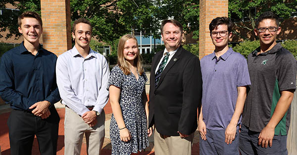 Engineering Dean Leo Kempel (center) greeted MSU's newest Von Ehr Scholars during a reception Aug. 28 in the College of Engineering Building. Scholars (from left) Max Wiedemann, Matt Heilman, and Katharine Walters were joined by current scholars Edward Kennedy and Mitchell Agrwal. Von Ehr scholarships are renewable for four years.