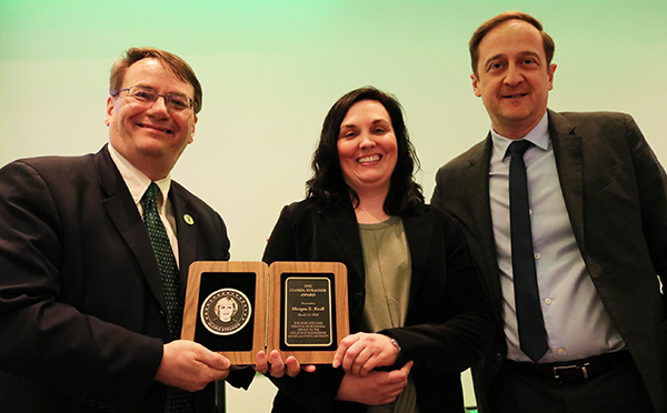 Meagan Kroll's dedicated and creative service was honored with the 2019 Gloria Stragier Award, presented by Dean Leo Kempel and ECE Chair John Papapolymerou.