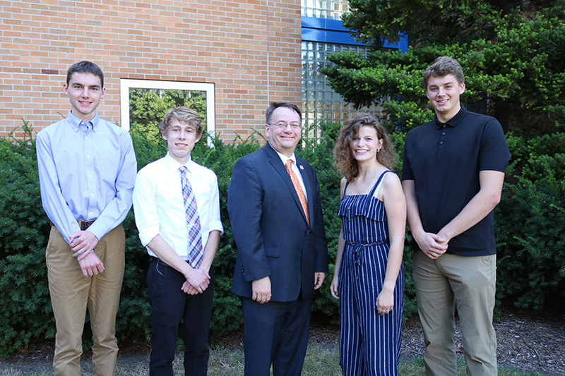 Engineering Dean Leo Kempel (center) greeted MSU's newest Von Ehr Scholars during a reception Aug. 27. Scholars are (from left) Ethan James, Christopher Cardimen, Mikayla Norton, and Sam Bay.