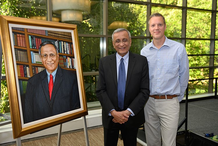 A portrait honoring Satish Udpa, eighth dean of the college, was created by artist Brian Kirschensteiner (right).