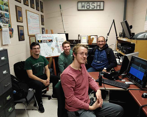 MSUARC enters its second century with support from Spartans (front) Kyle Maclean and Tyler Peterson (KE8KXY), Kyle Oliynyk (KE8KXW), and Volkan  Yildirim (KE8KYB).