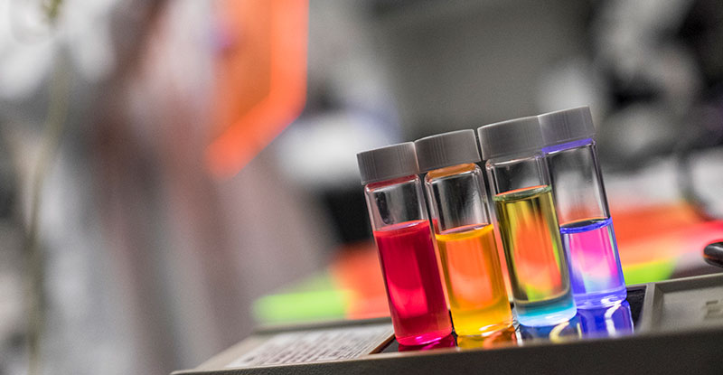 Variety of vials with liquid inside of them