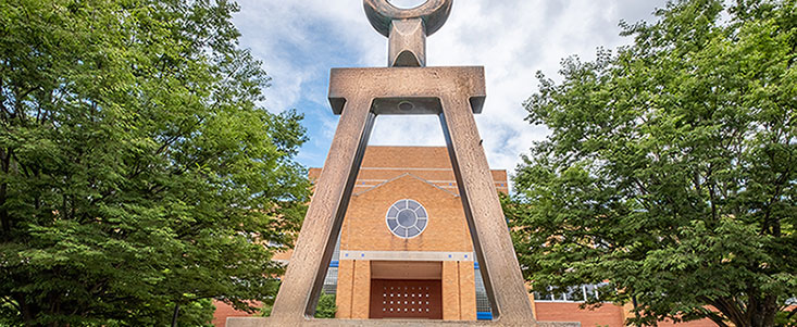 Close-up of the Beta statue behind the College of Engineering