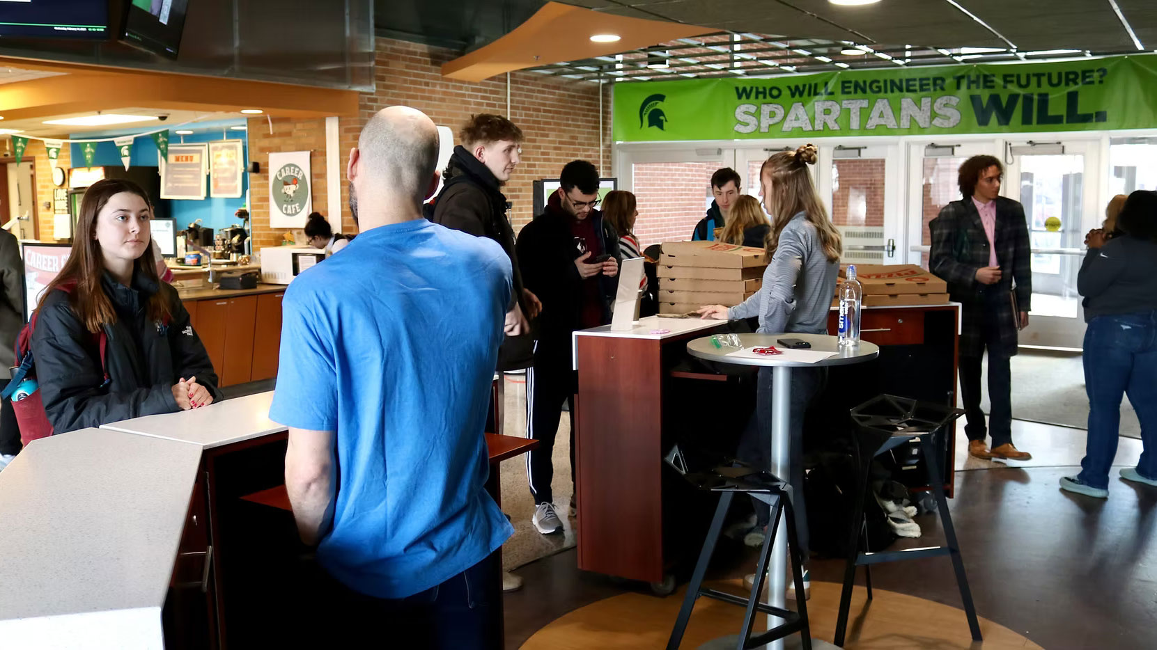 Students talking to employers