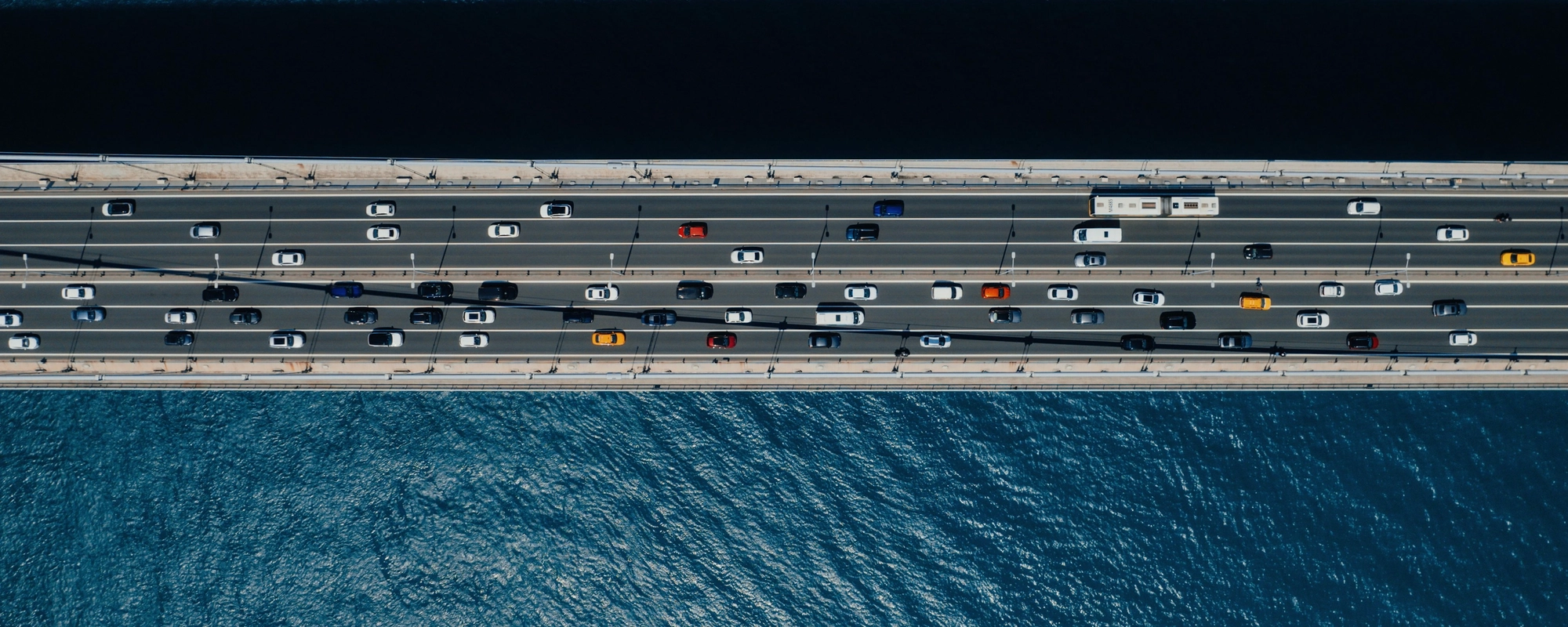Cars driving over a bridge