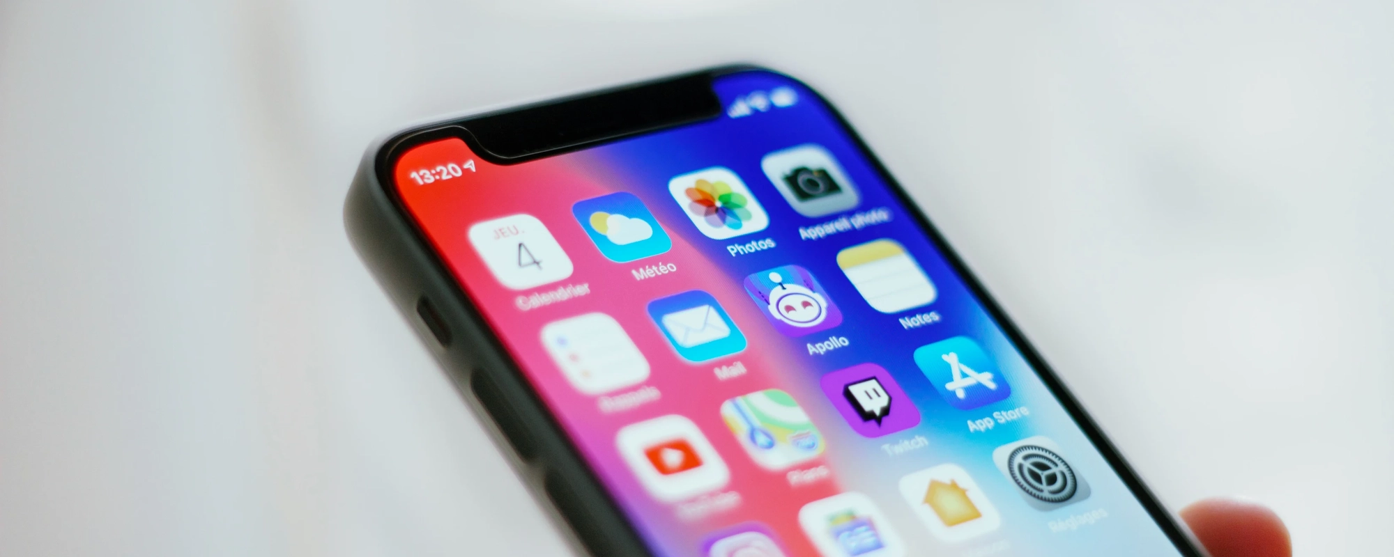iPhone home screen with apps displaying