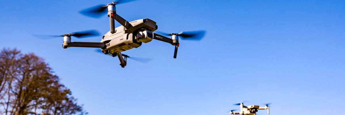 Drones in air protecting perimeter