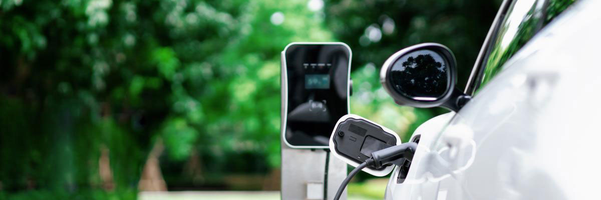 EV car parked at battery charging station