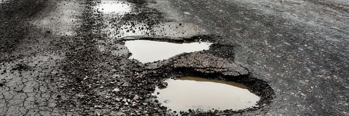 Potholes in roadway