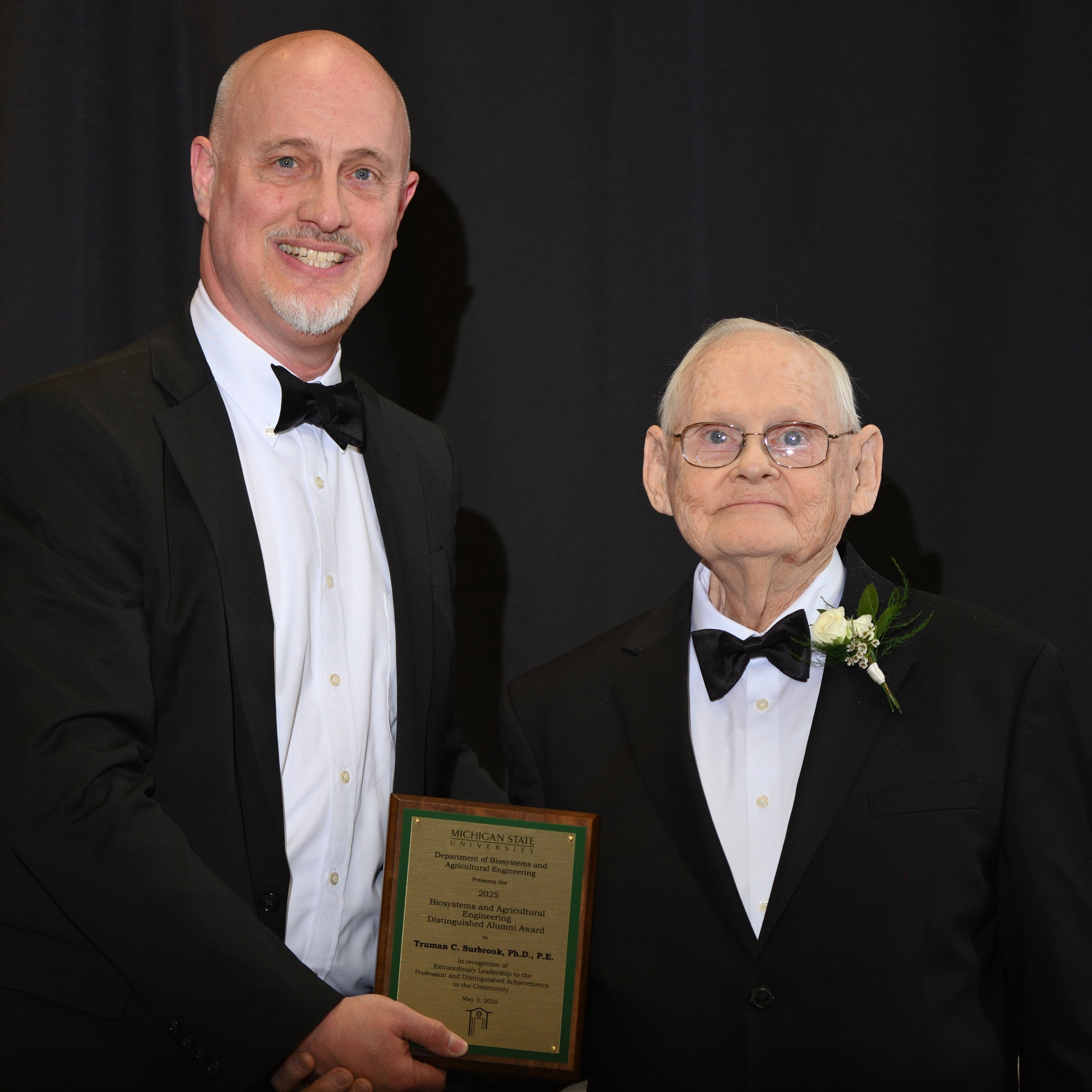 Brad Marks and Truman C. Surbrook posing with the award