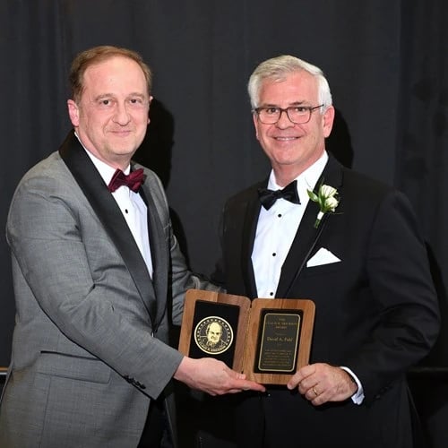 John Papapolymerou and David A. Pahl posing with the award