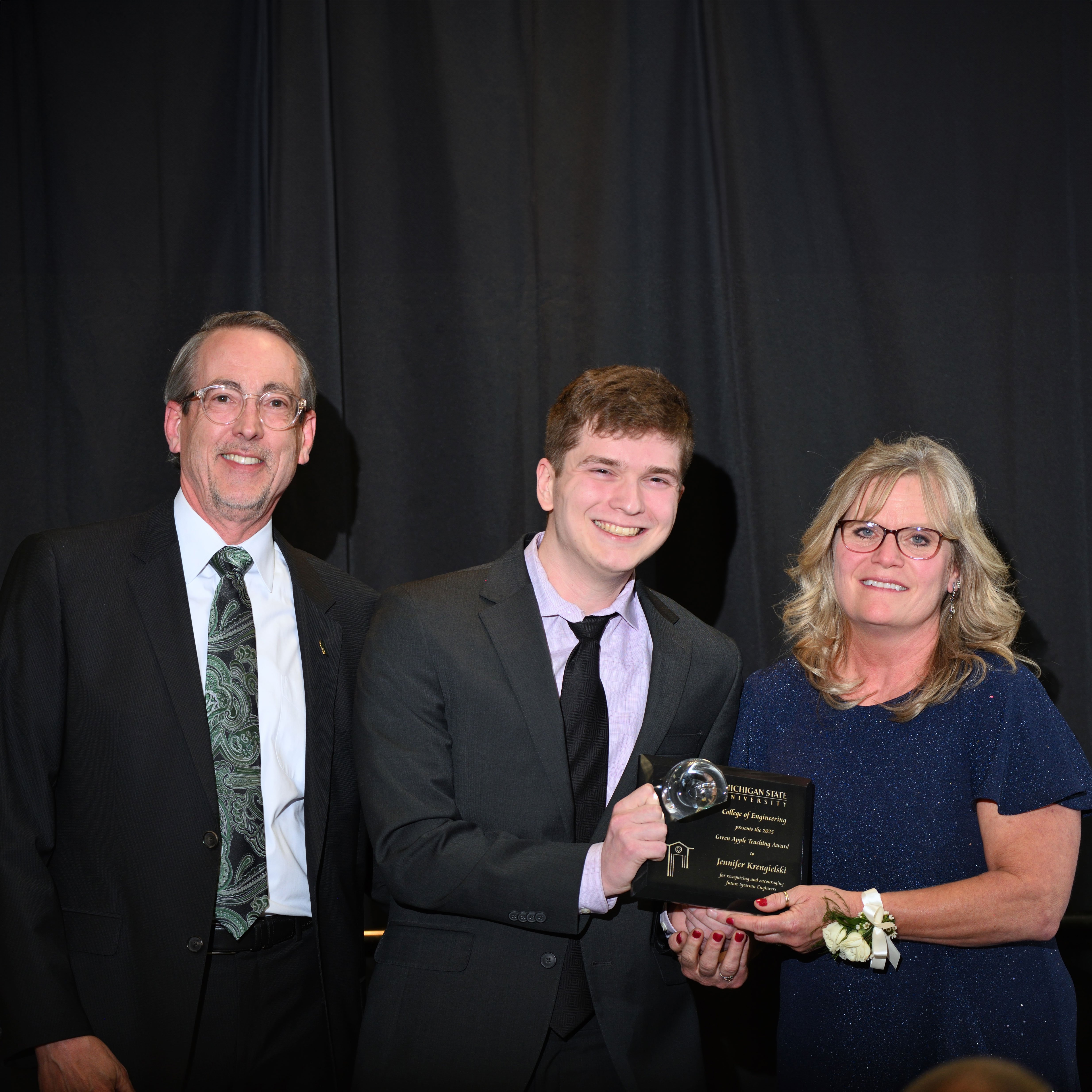 Chance Wilczynski and Jennifer Krengielski posing with the award