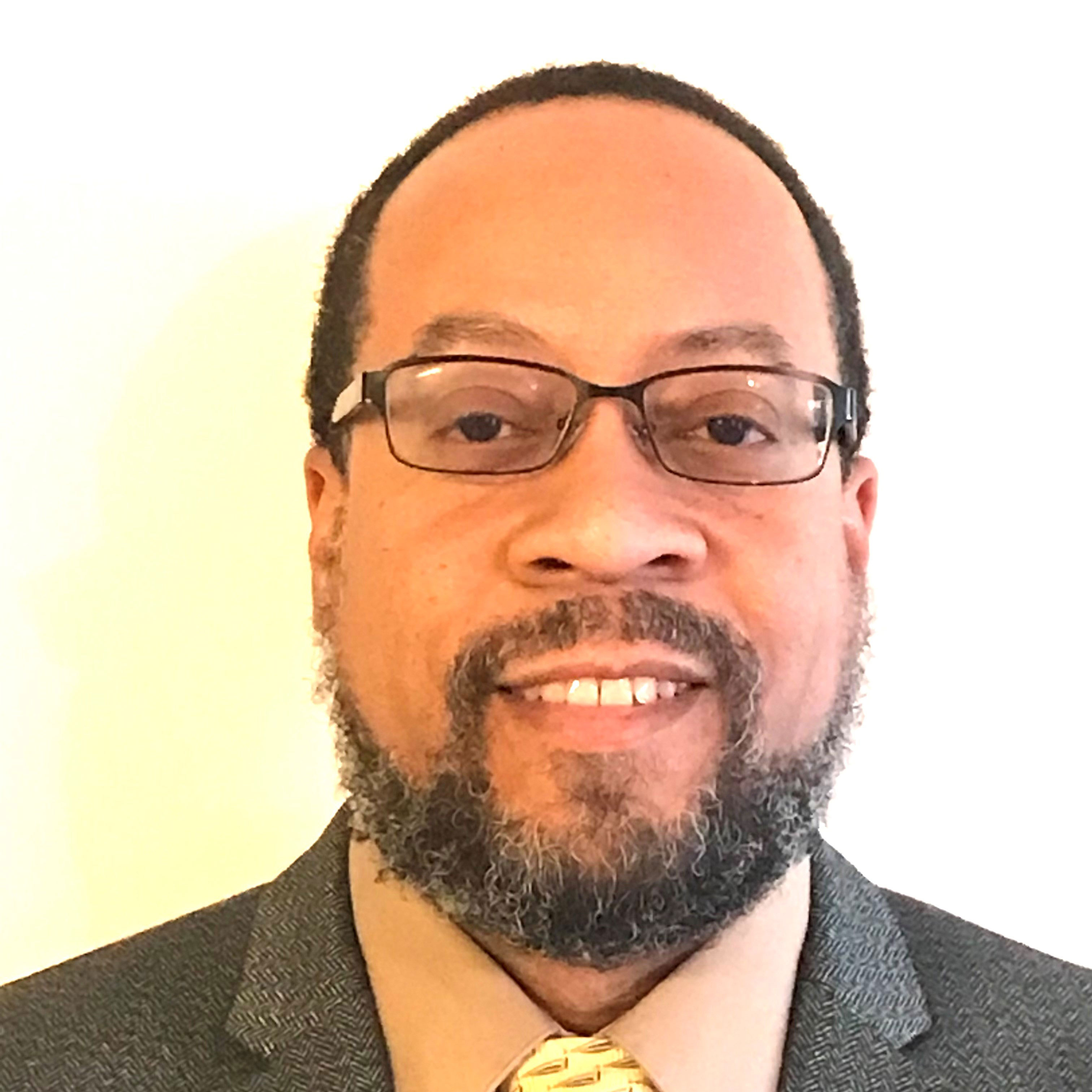 Professional headshot of Doctor Charles Macon