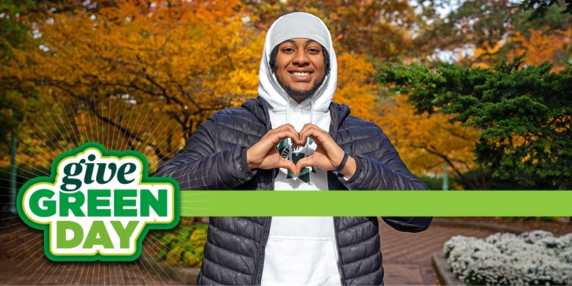 Engineering student, Joshua Buggs, making a heart with their hands