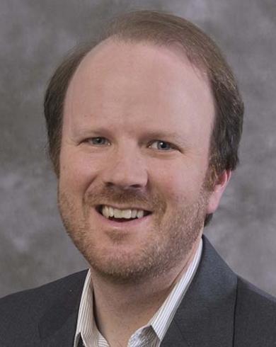 Michael Hickner smiling at the camera