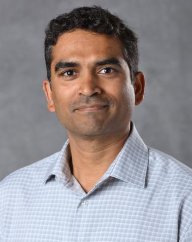Siva Nadimpalli smiling at the camera