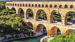 birds eye view of a brick constructed bridge over a water with the text over saying Science & Engineering french riviera