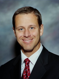 Professional headshot of Eric Seger