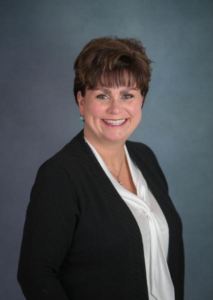 Professional headshot of Holly D. Aikens