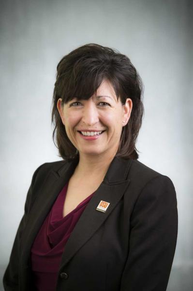 Professional headshot of Mitzi Montoya