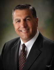 Professional headshot of Phillip L. Floravante