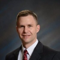 Professional headshot of Chad B. Steiner