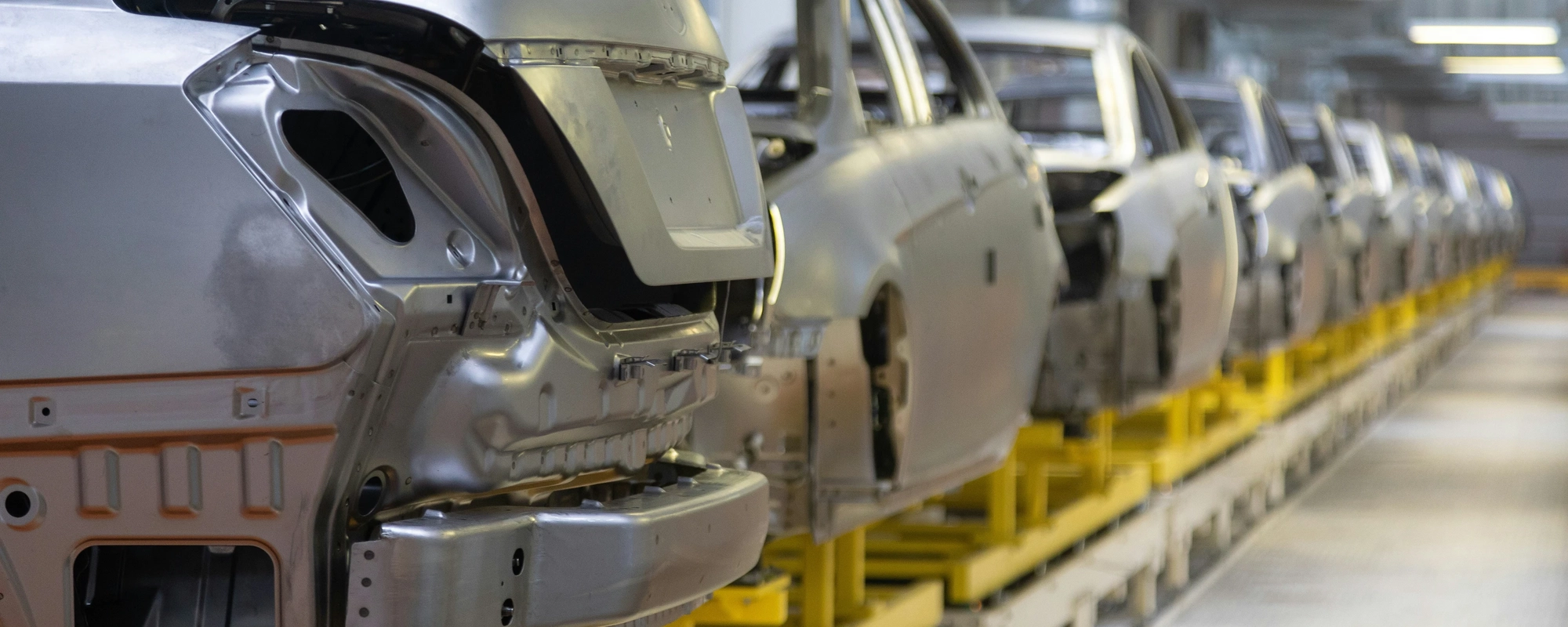 Car frames in assembly line