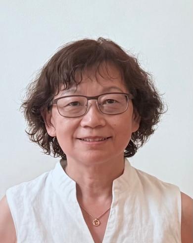 Cheri Deng smiling at the camera