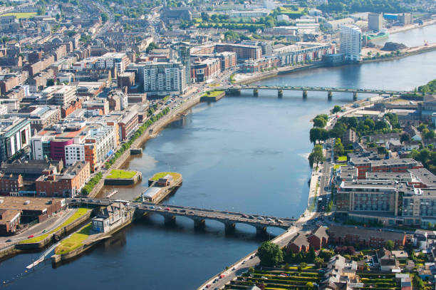 birds eye view of a mountain like landscape next to water view in Ireland