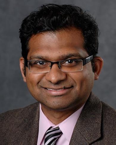 Arun Ross smiling at the camera
