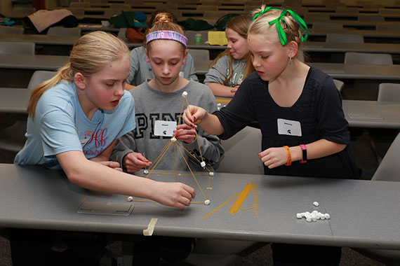 K-12 students working on a project