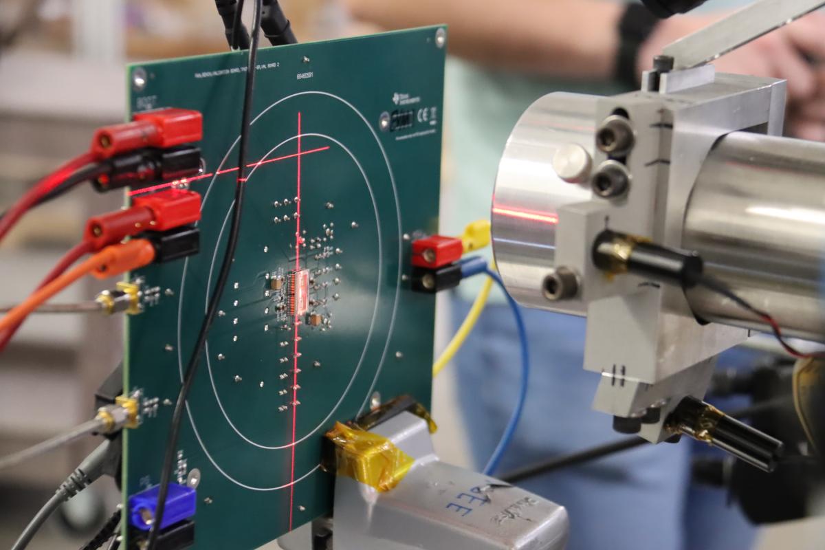 Close up shot of circuit board with laser marks in red