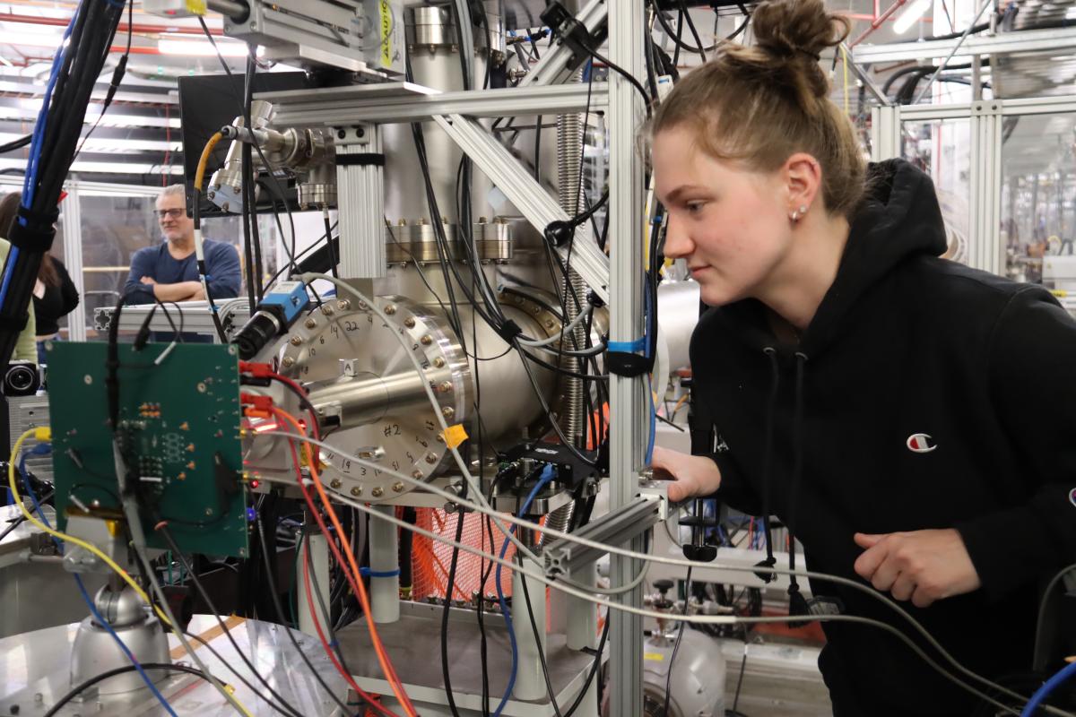 Student working with machinery
