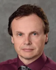 Professional headshot of Thomas Schuelke