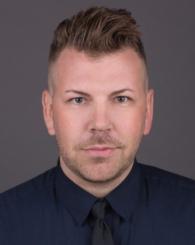 Professional Headshot of Alex Delavan