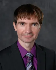 Professional Headshot of Alexei Bazavov