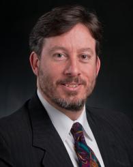 Professional headshot of John Verboncoeur