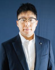 Professional headshot of Yansong Pei