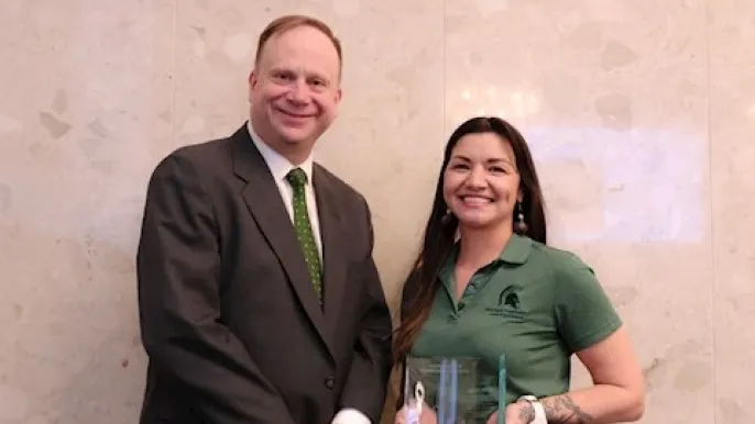 Erica Weeks wins Excellence in Community Building Award